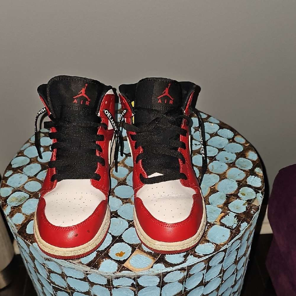 Red and White Nike Air Jordans High-Top Sneakers